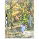 Little Girl Walking in Autumn Woods