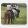 Little girls riding horses mousemats