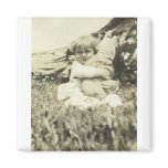 Little kid holding a cute bunny fridge magnets