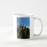 Little Red Robot Walking Over a Hill Mug