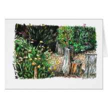 Log seats in a garden greeting card