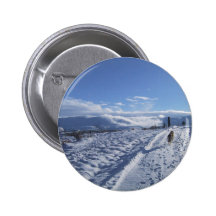 Lone Dog Walks Up A Snow Covered Road Buttons