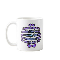 Love may not make the world go round. coffee mugs