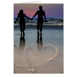 Lovers Holding Hands Walking into the Beach Sunset Cards