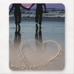 Lovers Holding Hands Walking into the Beach Sunset mousepads