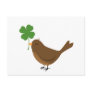 Lucky bird holding a four leaf clover postcard