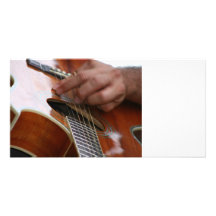male hand holding pick on acoustic guitar photo cards
