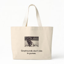 Man and grey on bicycle in England, Bags