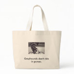 Man and grey on bicycle in England, bags