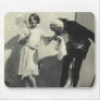 man kissing hand of child holding parasol mouse mat