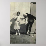 man kissing hand of child holding parasol posters