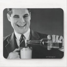 Man pouring beer from bottle to pitcher (B&W), Mouse Pad
