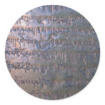Mantras written in bronze metal stickers