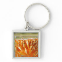 Many goldfish which are in the glass container key chain