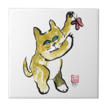 Marmalade Cat Chases Buttery Ceramic Tiles