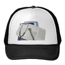 medical stethoscope on cardiogram EKG readings Trucker Hats