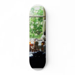 Medicine and Hurricane Lamp on Desk skateboards