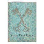 Medieval 21st keys against vintage blue pattern cards