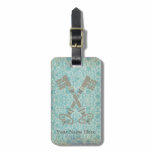 Medieval 21st keys against vintage blue pattern luggage tags