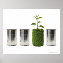 Metal cans and new seedling growth showing poster