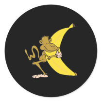 monkey hugging banana round sticker