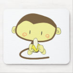 Monkey peeling a banana mousepads