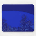 Moon and trees with blue sky mouse pad