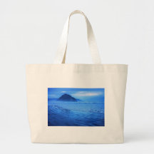 Morro Rock with seascape and sand Tote Bags