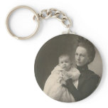 mother holding baby keychains