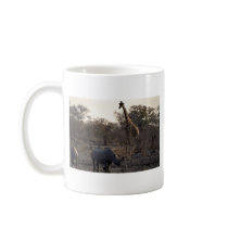 Mother rhino and young rhino at a watering place mug
