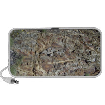 Mountain Rock Wall with Tiny Yellow Flowering Plan iPod Speakers