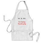 Mr. & Mrs., Are Cooking Something Up Aprons