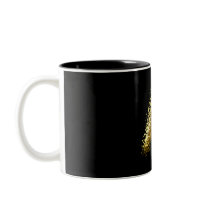 Mug with a gold letter "A" on a black base