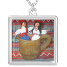 Necklace: Ethnic flirting couple