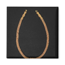Necklace with a human-headed pendant