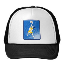 netball player catching passing ball hat