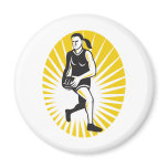 netball player running with ball magnets