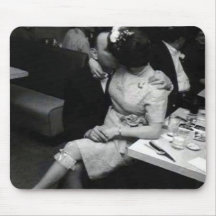 newlyweds kissing at a resturaunt mouse mats
