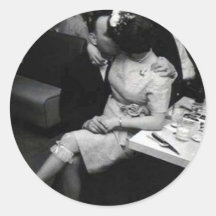 newlyweds kissing at a resturaunt sticker
