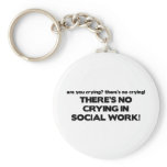 No Crying in Social Work keychains