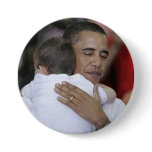 Obama-hugging a child buttons