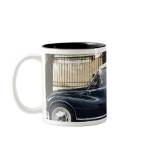 Old but very well kept Audi car. Mugs
