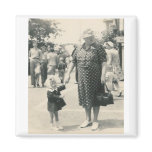 old lady and girl pointing magnet