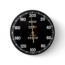 old speedometer gauge from a vintage race car button