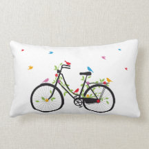 Old vintage bicycle with flowers and birds pillows