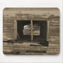 Old wooden building broken out window sepia tone mousepad