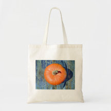 Orange Pumpkin on table - top view Canvas Bag
