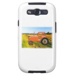 Orange Tractor in the Farm Fields
