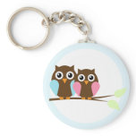 Owl couple on a branch