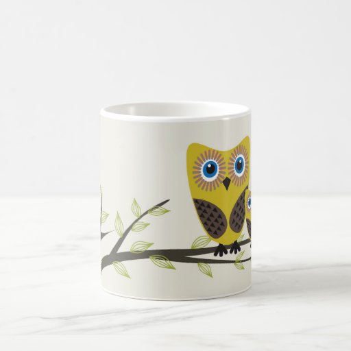 Owls couple on the tree. coffee mugs